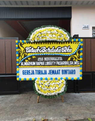 Papan Bunga Duka di Kolf Braza